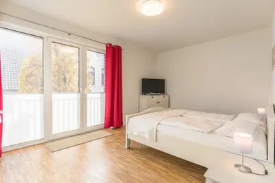Ein Bett oder Betten in einem Zimmer der Unterkunft Kirchenstr 22 Nordlichter