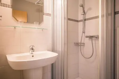 Ein Badezimmer in der Unterkunft 