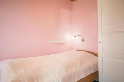 Ein Bett oder Betten in einem Zimmer der Unterkunft 