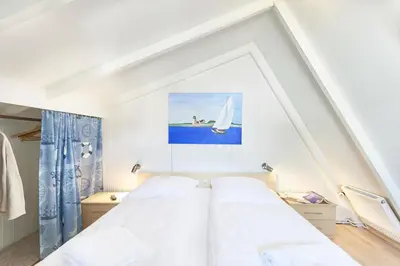 Ein Bett oder Betten in einem Zimmer der Unterkunft Am Ringwall 91 - Seelöwe B