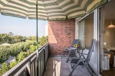 Ein Balkon oder eine Terrasse in der Unterkunft 