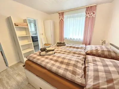 Ein Bett oder Betten in einem Zimmer der Unterkunft Haus Hachtmann