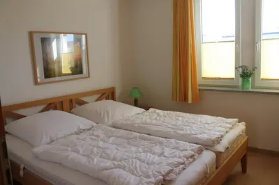 Ein Bett oder Betten in einem Zimmer der Unterkunft Nordseeblick 6