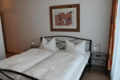 Ein Bett oder Betten in einem Zimmer der Unterkunft Nordseeblick 6
