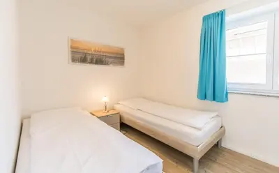 Ein Bett oder Betten in einem Zimmer der Unterkunft 