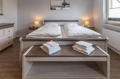 Ein Bett oder Betten in einem Zimmer der Unterkunft 
