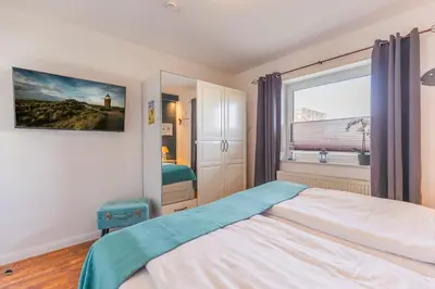 Ein Bett oder Betten in einem Zimmer der Unterkunft 