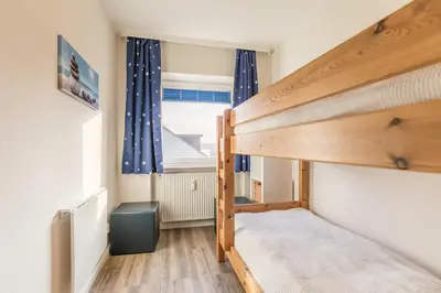 Ein Bett oder Betten in einem Zimmer der Unterkunft Jessica Jessica, Whg 16