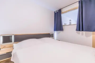 Ein Bett oder Betten in einem Zimmer der Unterkunft 