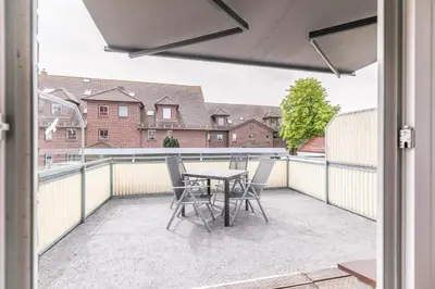 Ein Balkon oder eine Terrasse in der Unterkunft 