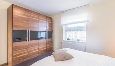 Ein Bett oder Betten in einem Zimmer der Unterkunft Am Ankerplatz Am Ankerplatz Whg 2 4