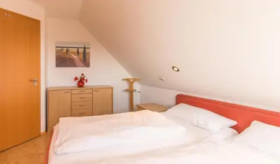 Ein Bett oder Betten in einem Zimmer der Unterkunft 