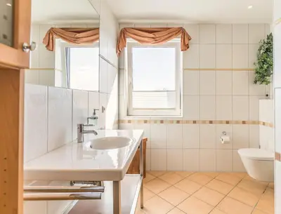 Ein Badezimmer in der Unterkunft 
