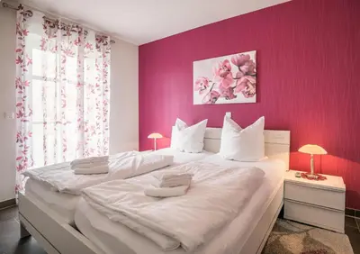 Ein Bett oder Betten in einem Zimmer der Unterkunft 