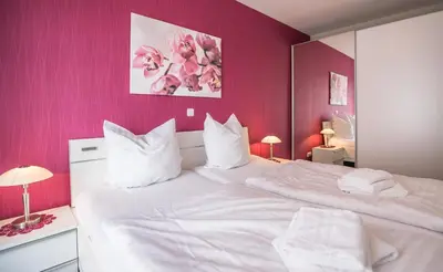 Ein Bett oder Betten in einem Zimmer der Unterkunft 