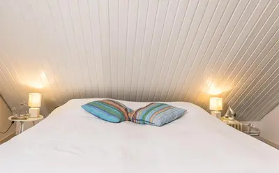 Ein Bett oder Betten in einem Zimmer der Unterkunft 