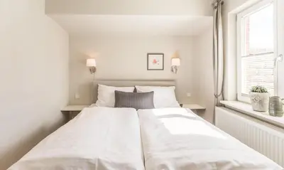 Ein Bett oder Betten in einem Zimmer der Unterkunft 