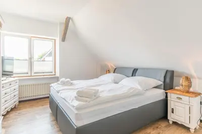 Ein Bett oder Betten in einem Zimmer der Unterkunft Ferienhaus Ben Ferienhaus Ben