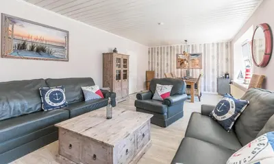 Ein Sitzbereich in der Unterkunft Ferienhaus Ben Ferienhaus Ben
