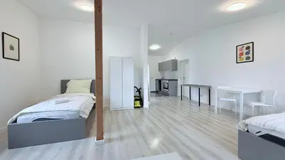 Ein Bett oder Betten in einem Zimmer der Unterkunft Monteurwohnung Brunsbüttel zentrale Lage mit Parkplatz & Schleusenblick