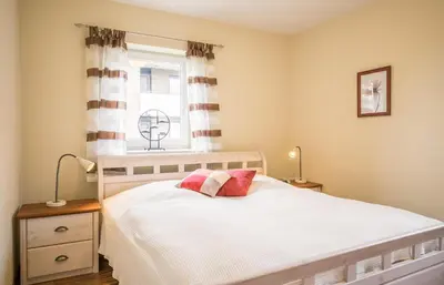 Ein Bett oder Betten in einem Zimmer der Unterkunft Domizil am Hafen Domizil am Hafen, Whg Carlotta