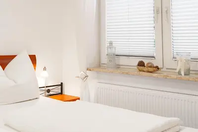 Ein Bett oder Betten in einem Zimmer der Unterkunft 