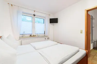 Ein Bett oder Betten in einem Zimmer der Unterkunft 