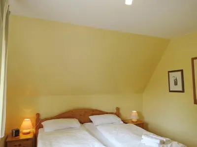 Ein Bett oder Betten in einem Zimmer der Unterkunft Lucy Ferienwohnung Lucy