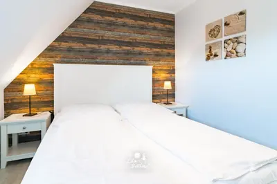Ein Bett oder Betten in einem Zimmer der Unterkunft 