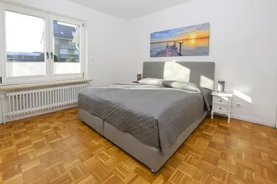 Ein Bett oder Betten in einem Zimmer der Unterkunft Haus im Törn Haus im Törn, Whg 2