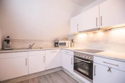 Küche/Küchenzeile in der Unterkunft Haus im Törn Haus im Törn, Whg 3