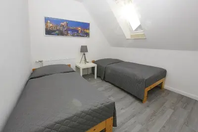 Ein Bett oder Betten in einem Zimmer der Unterkunft Haus im Törn Haus im Törn, Whg 3