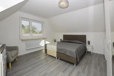 Ein Bett oder Betten in einem Zimmer der Unterkunft Haus im Törn Haus im Törn, Whg 4