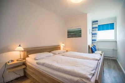 Ein Bett oder Betten in einem Zimmer der Unterkunft 