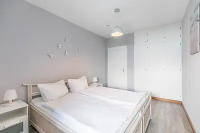 Ein Bett oder Betten in einem Zimmer der Unterkunft 