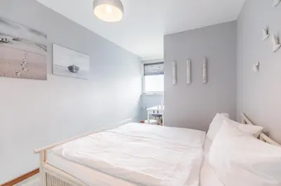 Ein Bett oder Betten in einem Zimmer der Unterkunft 