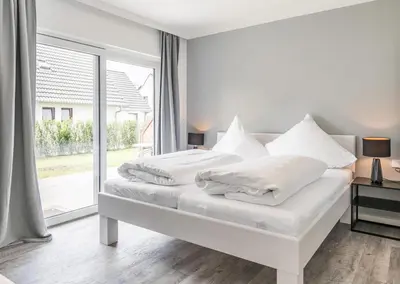 Ein Bett oder Betten in einem Zimmer der Unterkunft 