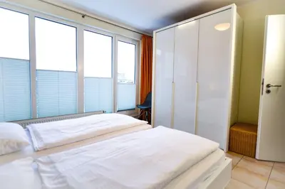 Ein Bett oder Betten in einem Zimmer der Unterkunft Haus am Waldbad AW25