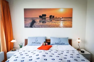 Ein Bett oder Betten in einem Zimmer der Unterkunft Haus am Waldbad AW26