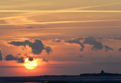 Blick auf den Sonnenuntergang/Sonnenaufgang von der Ferienwohnung aus oder aus der Nähe