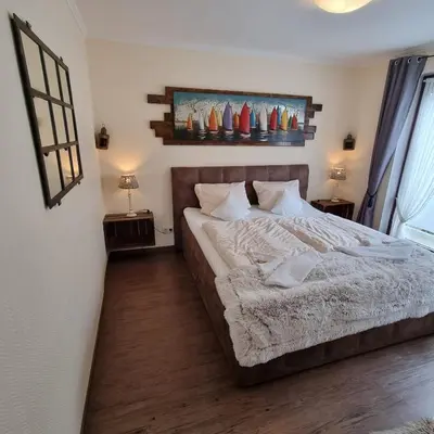 Ein Bett oder Betten in einem Zimmer der Unterkunft Haus Kaiser Appartement 3 Deichlust