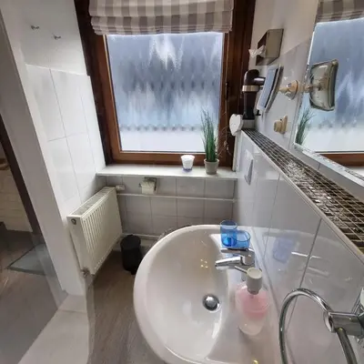 Ein Badezimmer in der Unterkunft Haus Kaiser Appartement 3 Deichlust