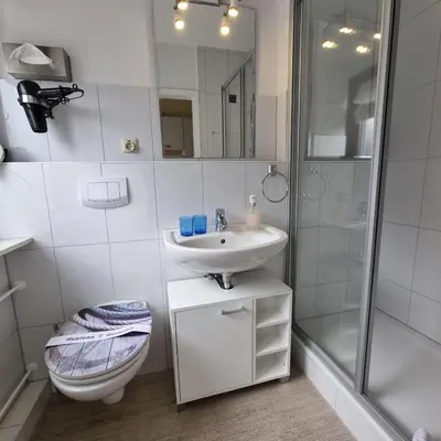 Ein Badezimmer in der Unterkunft Haus Kaiser Appartement 3 Deichlust