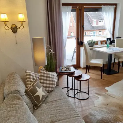 Ein Sitzbereich in der Unterkunft Haus Kaiser Appartement 4 Deichsommer