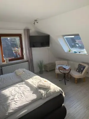 Ein Bett oder Betten in einem Zimmer der Unterkunft Haus Kaiser Appartement 6 Deichglück