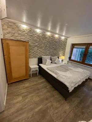 Ein Bett oder Betten in einem Zimmer der Unterkunft Haus Kaiser Appartement 16 Großer Deichtraum
