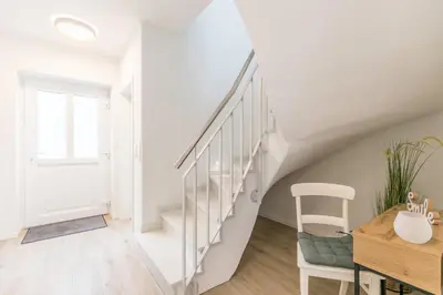 Ein Bett oder Betten in einem Zimmer der Unterkunft Deichidyll Deichidyll, Whg Glücksmomente