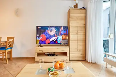 TV/Unterhaltungsangebot in der Unterkunft Duhner Brise - 10
