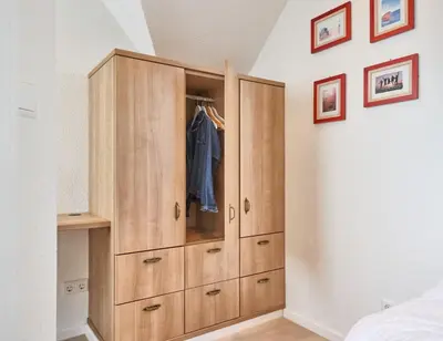 Ein Bett oder Betten in einem Zimmer der Unterkunft Strandburg - 12