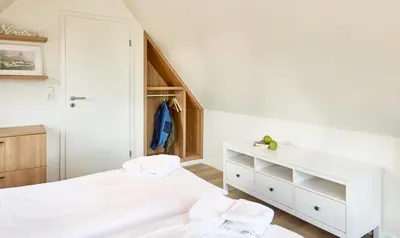 Ein Bett oder Betten in einem Zimmer der Unterkunft Strandburg - 12